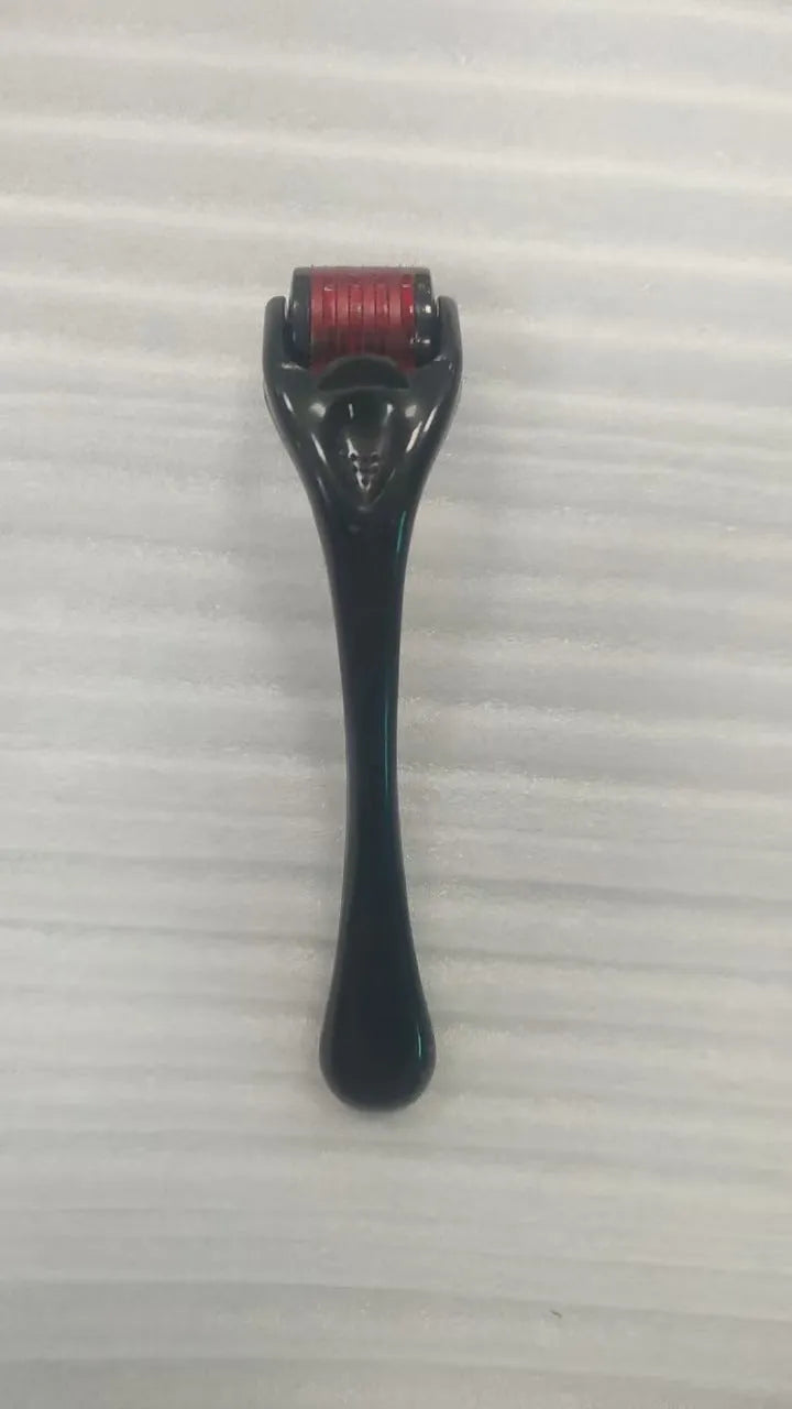 Black handle microneedle roller with purple wheel showing 540 needles, next to white and blue handle options.