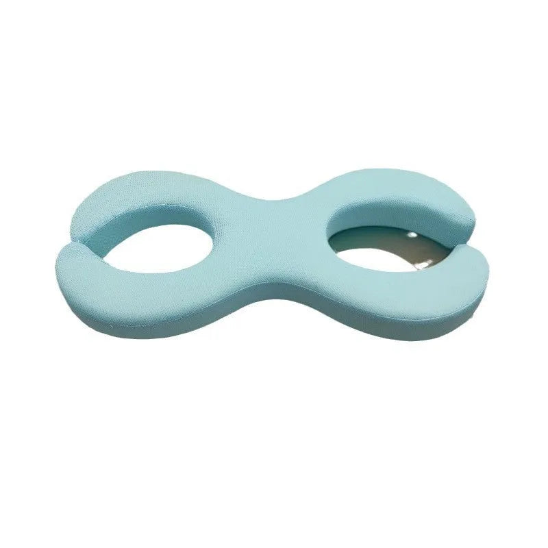 Blue cylindrical memory foam cervical pillow for neck support during sleep