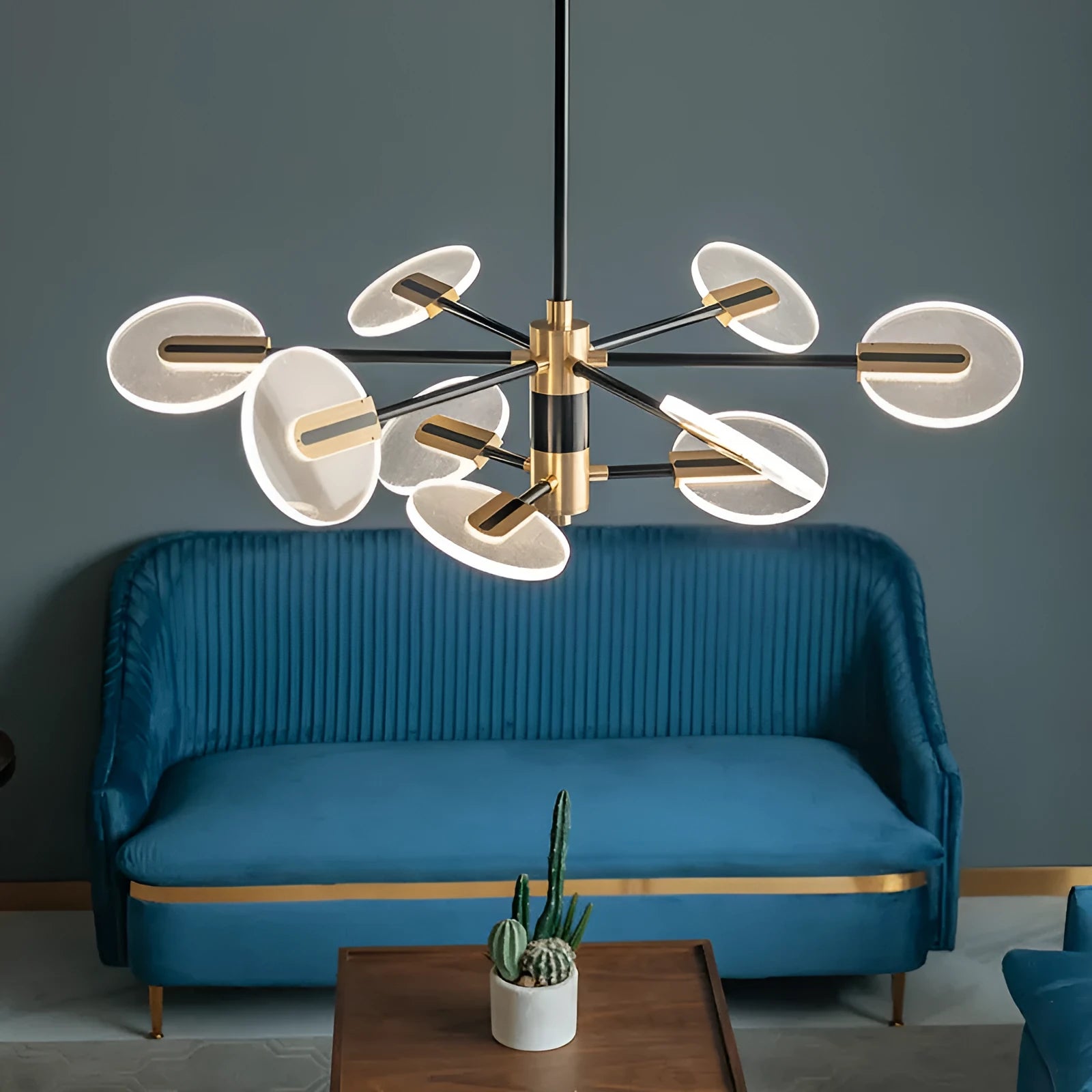 Nordic style iron frame LED pendant chandelier with acrylic body in a multi-head configuration.