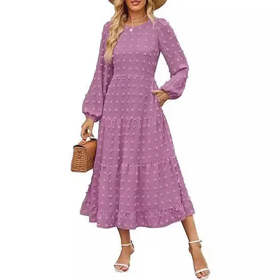 Women's beige high-waist long sleeve dress with ruffled sleeves on a hanger.