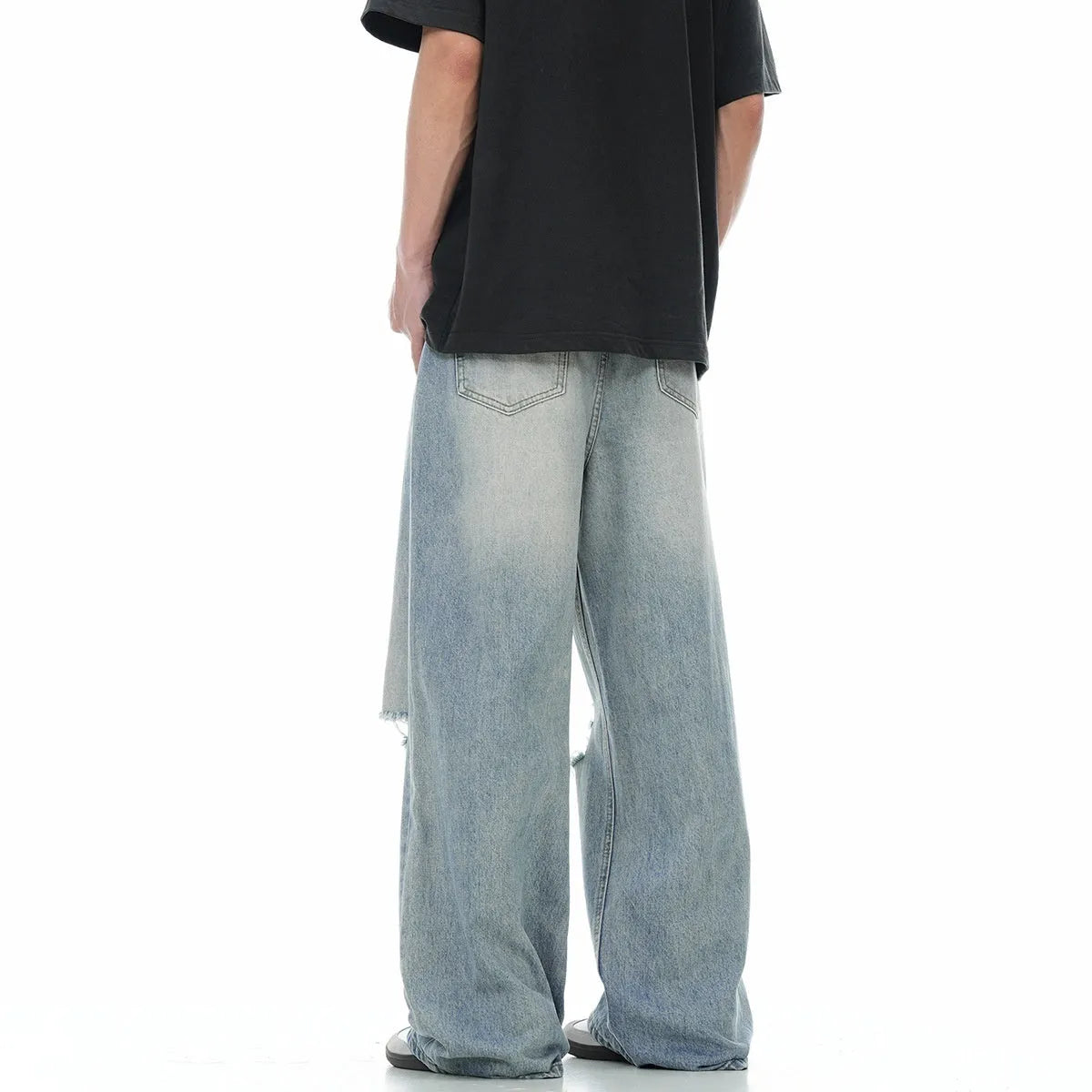 Blue men's straight-leg jeans with ripped detailing on a cotton blend fabric