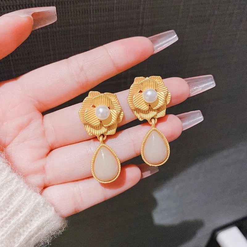 Gold colour flower stud earrings with needle rose pearl design and opal stone