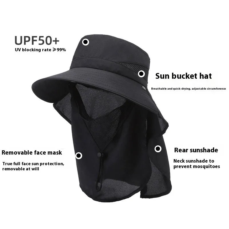 Man wearing a grey adjustable wide-brim fisherman hat made of polyester for sun protection.