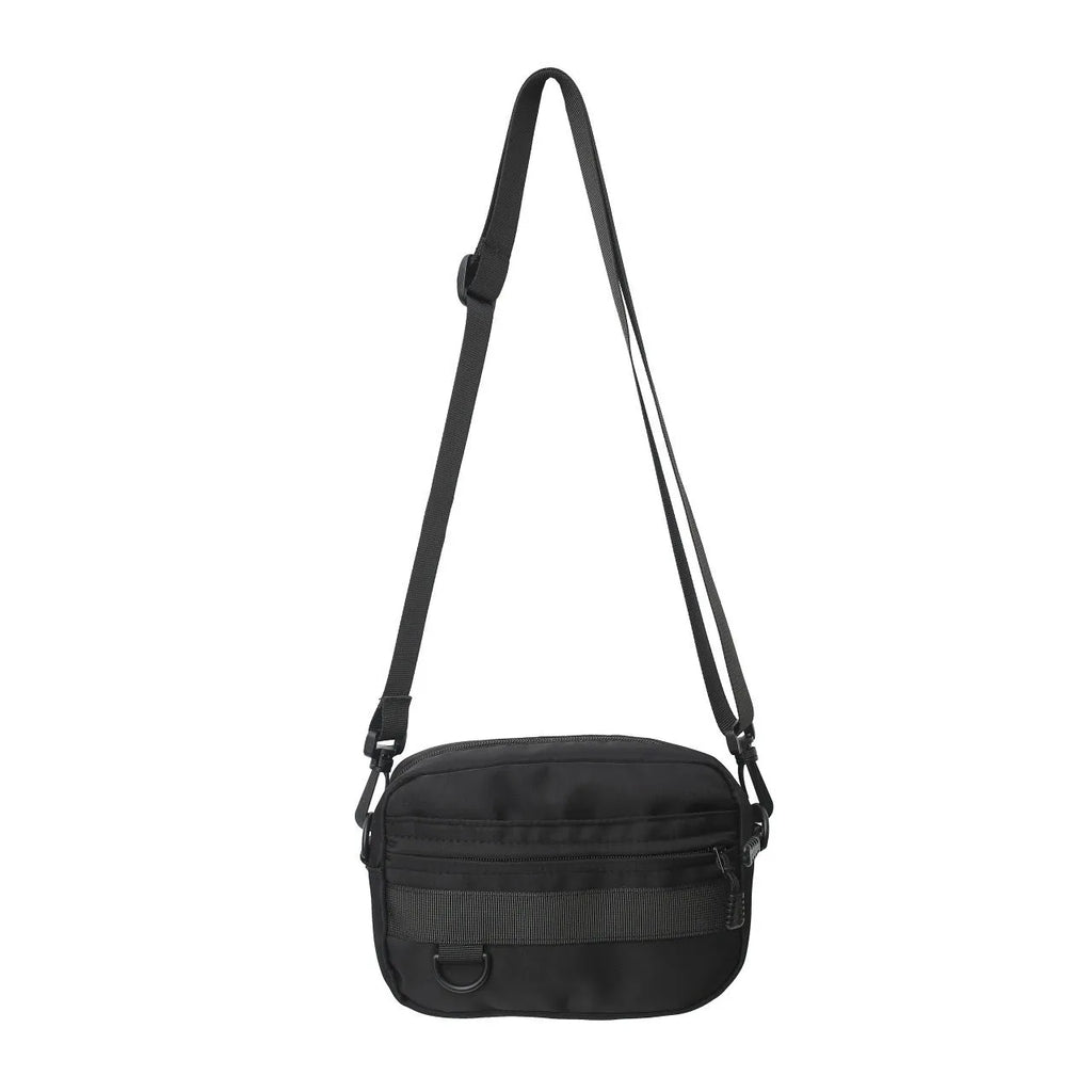 Men's street style nylon messenger bag in black with crossbody strap and sewing thread detailing