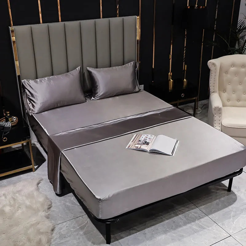 Artificial silk fitted sheet with elastic band in plain pattern, available in black and other colours