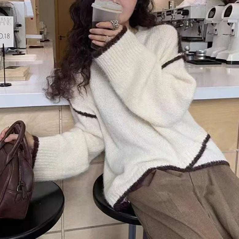 Women's idle style gray cotton loose pullover sweater on a plain background