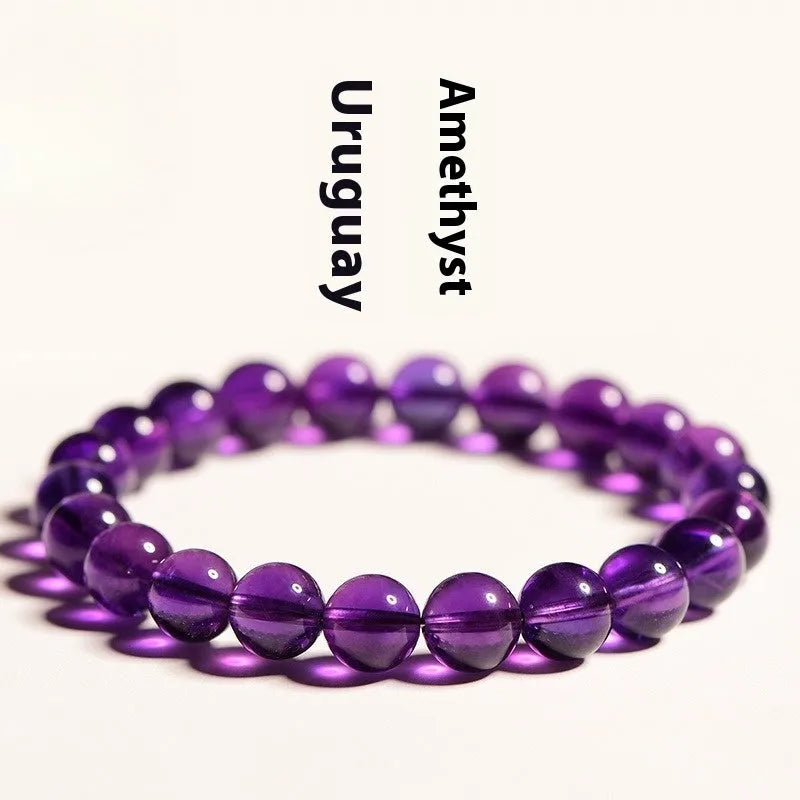 Natural amethyst bracelet with scattered Uruguay beads in jiuya colour, shown in selectable grades and sizes.