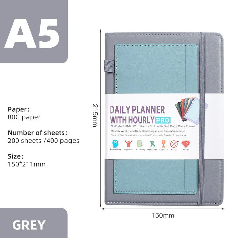 A5 undated notebook with PU leather cover in six colours, open to show flat-lay binding and planning stickers.