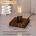 Iron art suspension bulb desktop night lamp on black wood-grain base