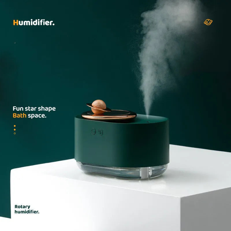 Rotating planet car humidifier in green colour with USB charging cable and 0.5L water tank