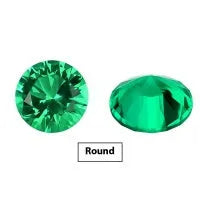 Selection of cultivated Columbia green emerald gemstones in various shapes and sizes on a white background.