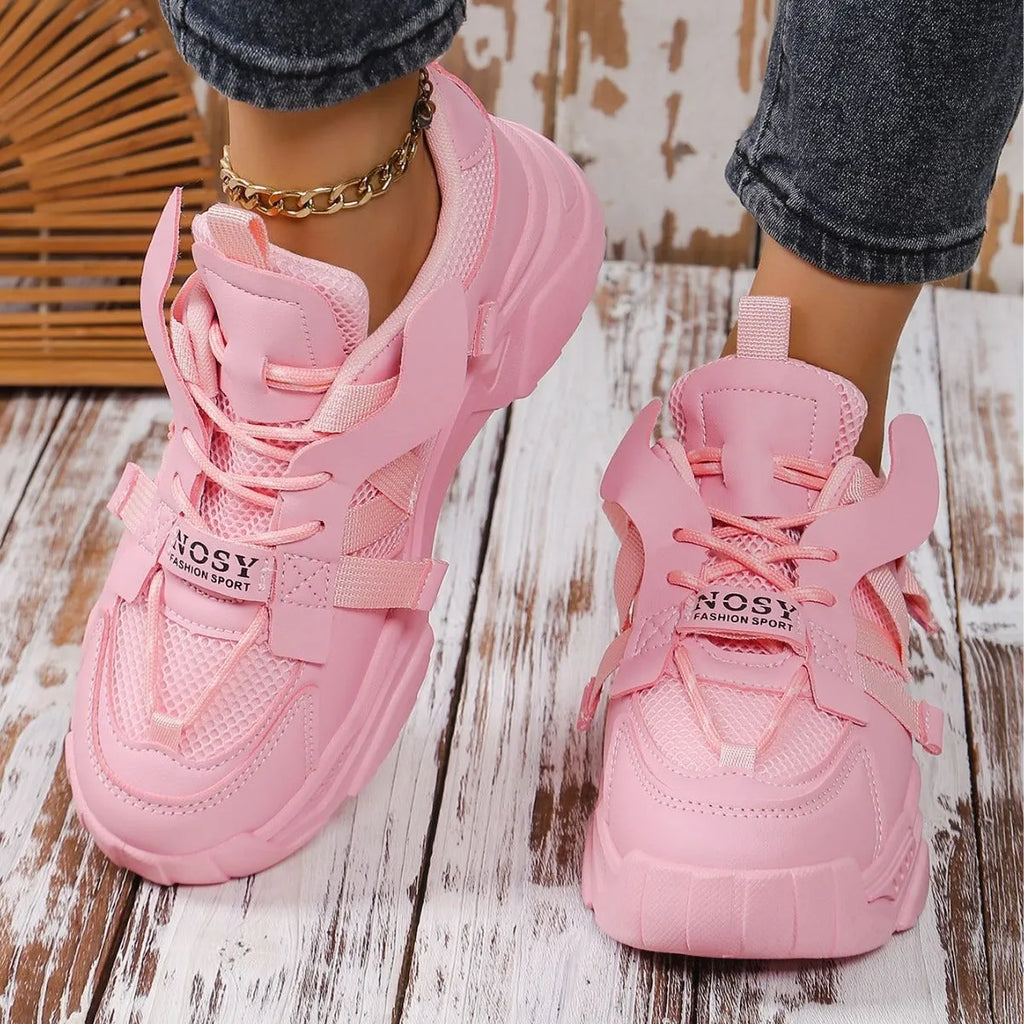 Women's platform mesh sports shoes in animal pattern design showing height increase sole and front lace-up closure