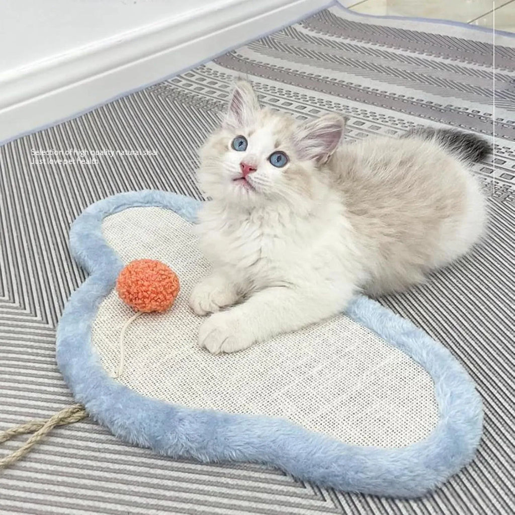 White wall-mounted cat scratching mat with natural sisal and sleeping cat cartoon design.