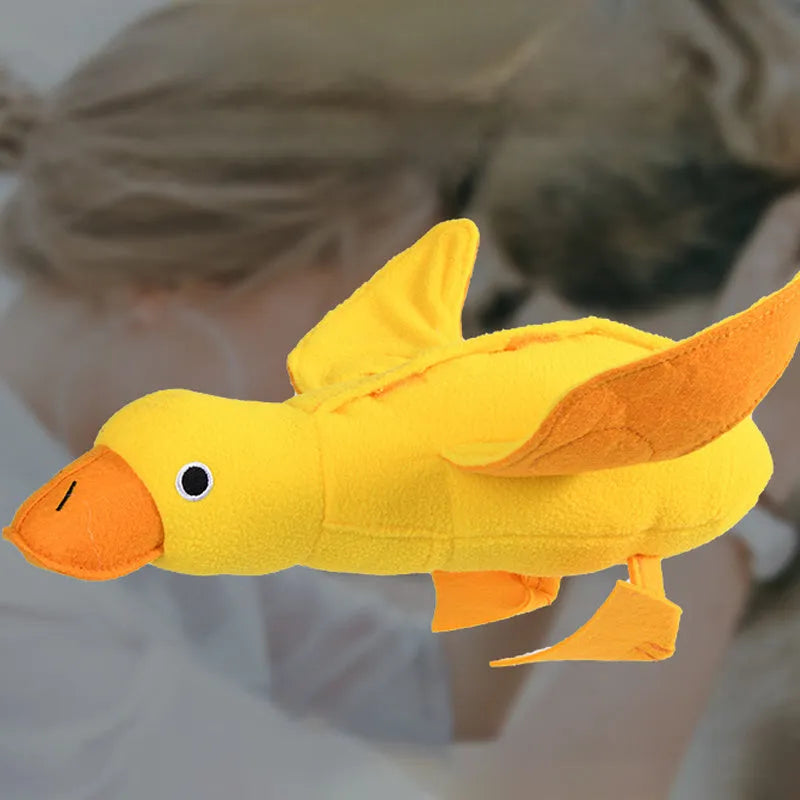 Yellow teddy-shaped rubber dog toy with squeaker duck sound and food leak holes