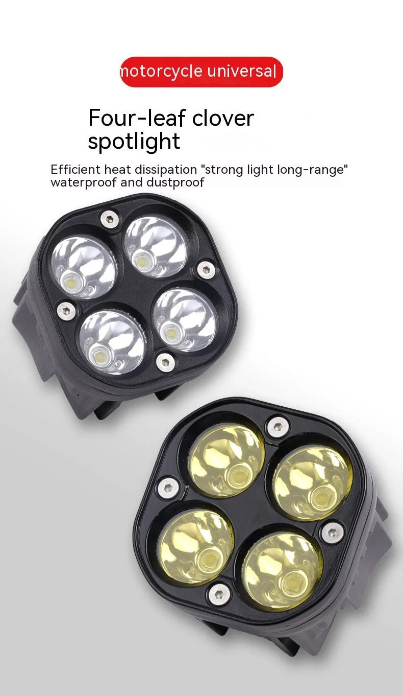 Four-eye automotive headlight with aluminium mounting base, showing four-leaf clover light pattern