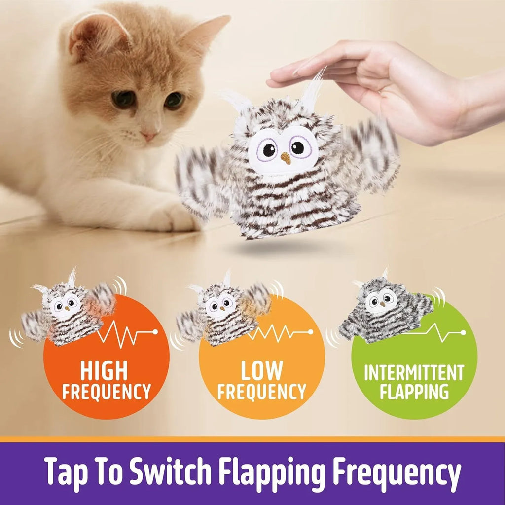 Grey automatic owl cat toy with flapping wings on flat surface, measuring 10cm by 14cm