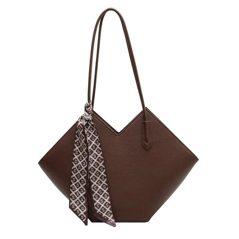 Women's large black PU shoulder bag with sandwich pockets showing horizontal square shape