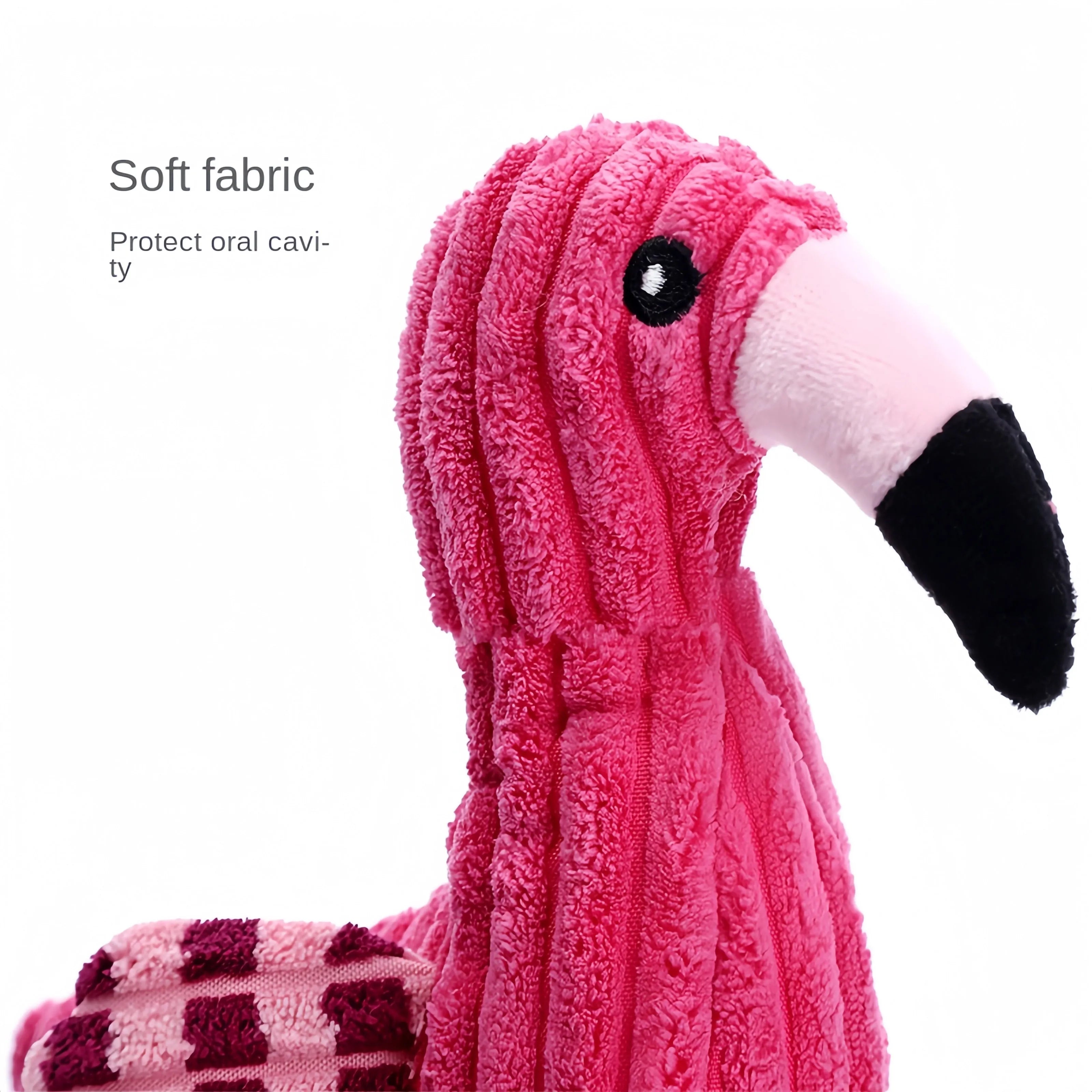 Pink animal-shaped corduroy squeaky dog toy with reinforced stitching