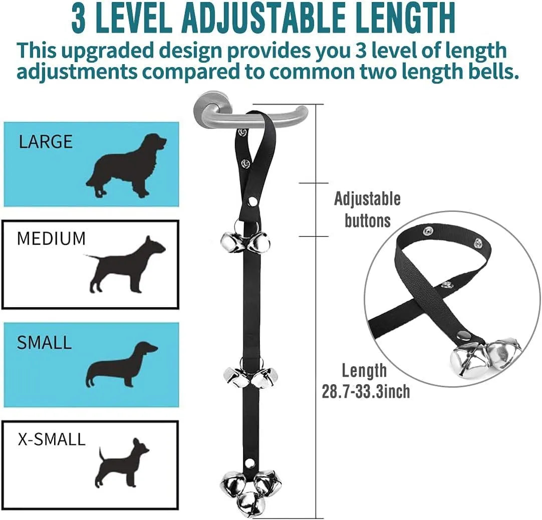 Seven silver metal dog training bells on a black adjustable nylon strap hanging from a door handle.
