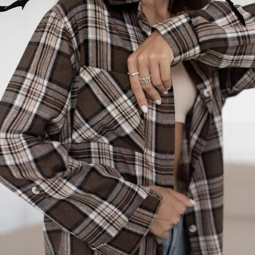 Dark brown retro striped women's long sleeve cotton shirt shown on a hanger.