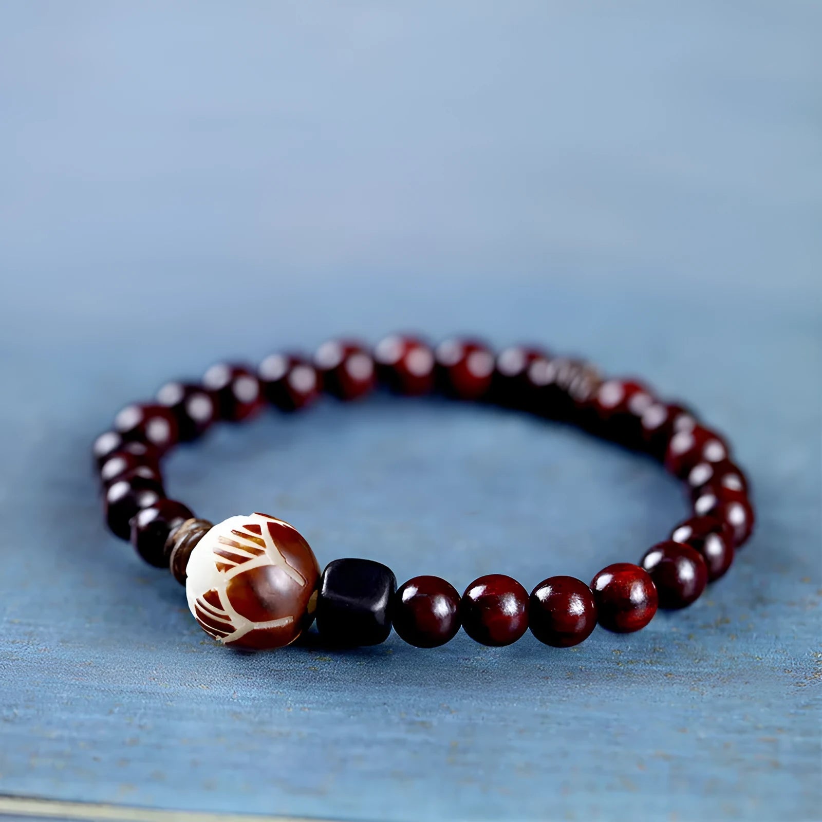 Natural rosewood bracelet with knitted texture and 10mm floral centrepiece in unisex retro design