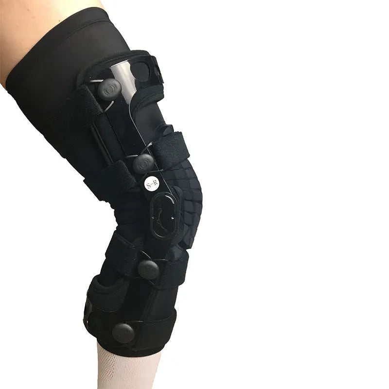 Black anterior ligament knee pad with plastic hinge components and sponge padding