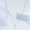 Women's double-layer sterling silver necklace with pearl chain detail in polished silver colour