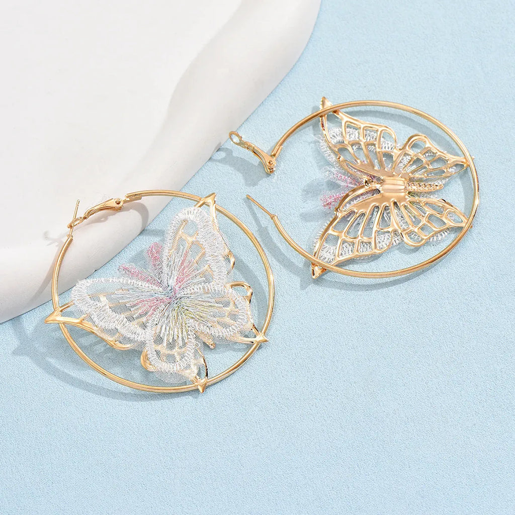 Gold butterfly clip-on earrings for women with geometric design and iron construction