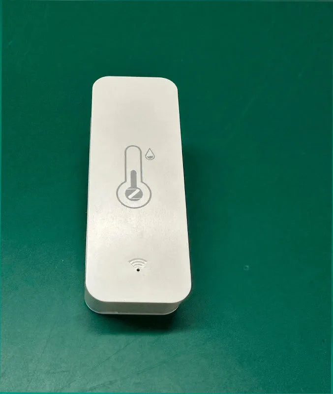 WiFi and Zigbee temperature humidity sensor with ABS plastic casing measuring 72mm