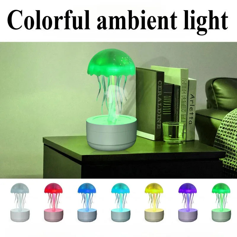 White jellyfish-shaped humidifier and essential oil diffuser with colourful LED night light on desktop
