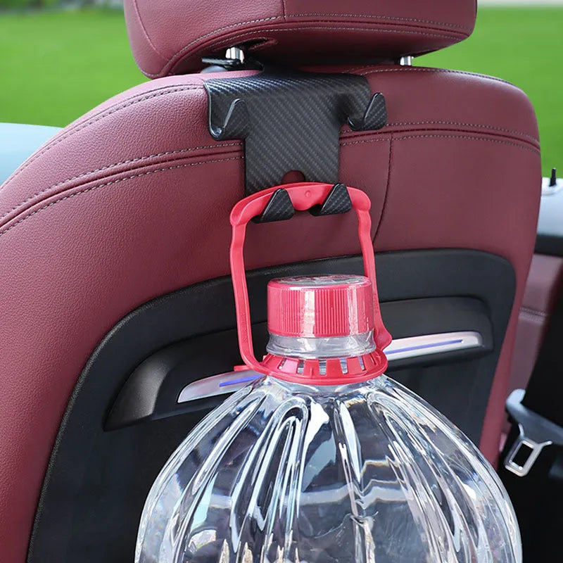 Black ABS plastic car hook bracket with integrated phone holder, shown from the side.