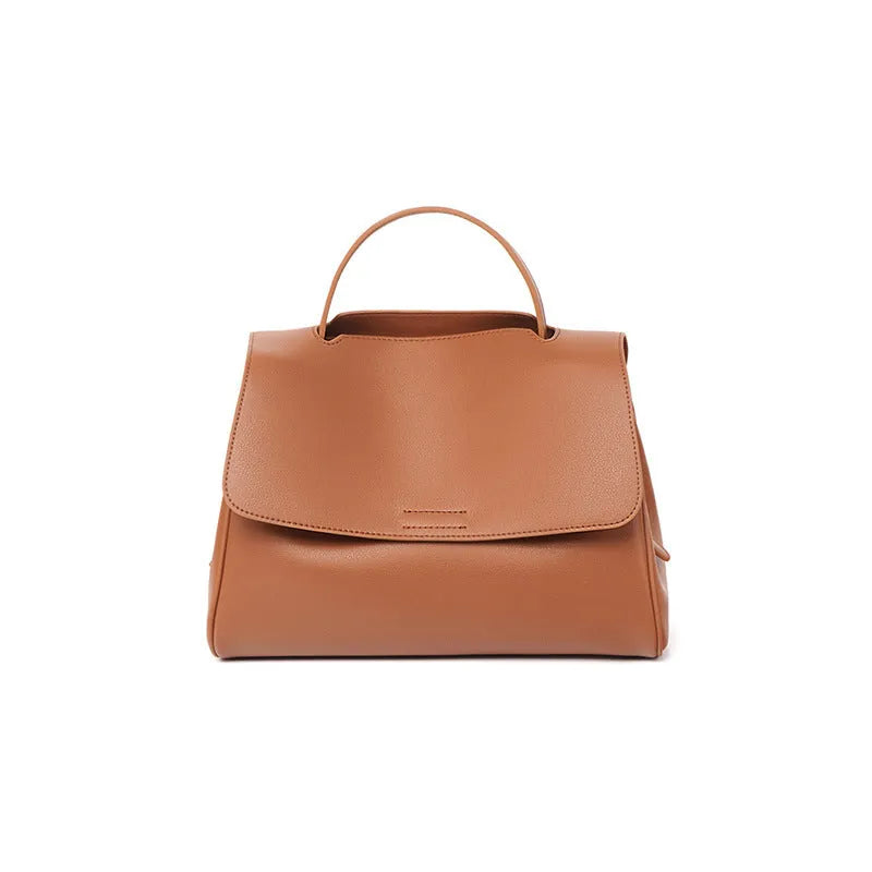 Soft genuine leather women's shoulder messenger bag in black, horizontal square shape with sewing thread detail