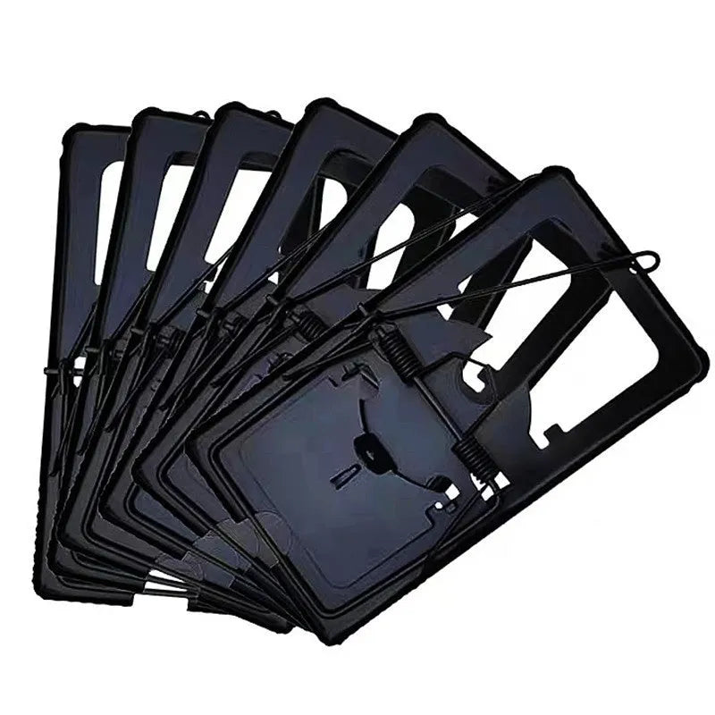 Automatic mouse cage trap with metal and plastic construction showing cage mechanism