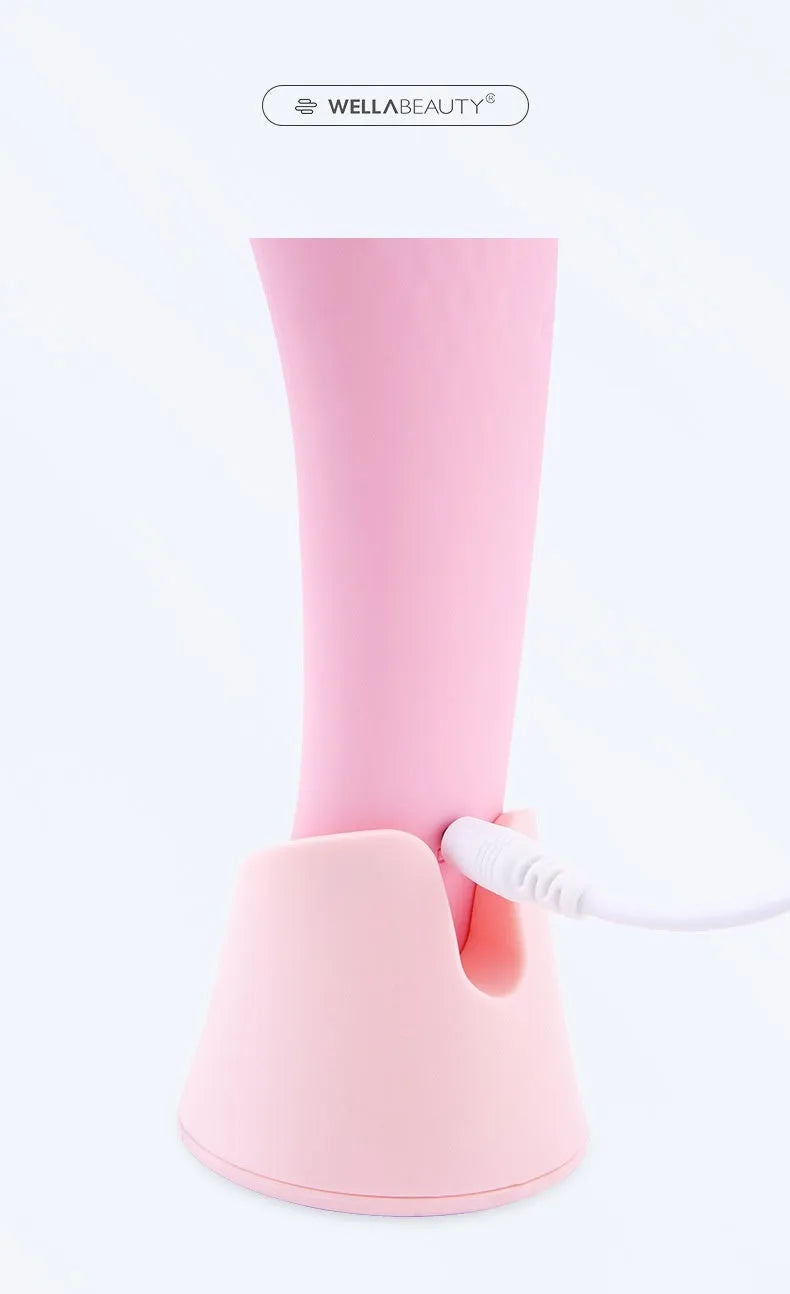 Pink electric silicone face cleansing brush with vibration and heating functions, USB rechargeable