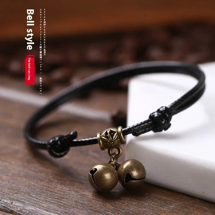 Nylon rope dog collar with a brass bell, shown in black, red, and coffee colour options.