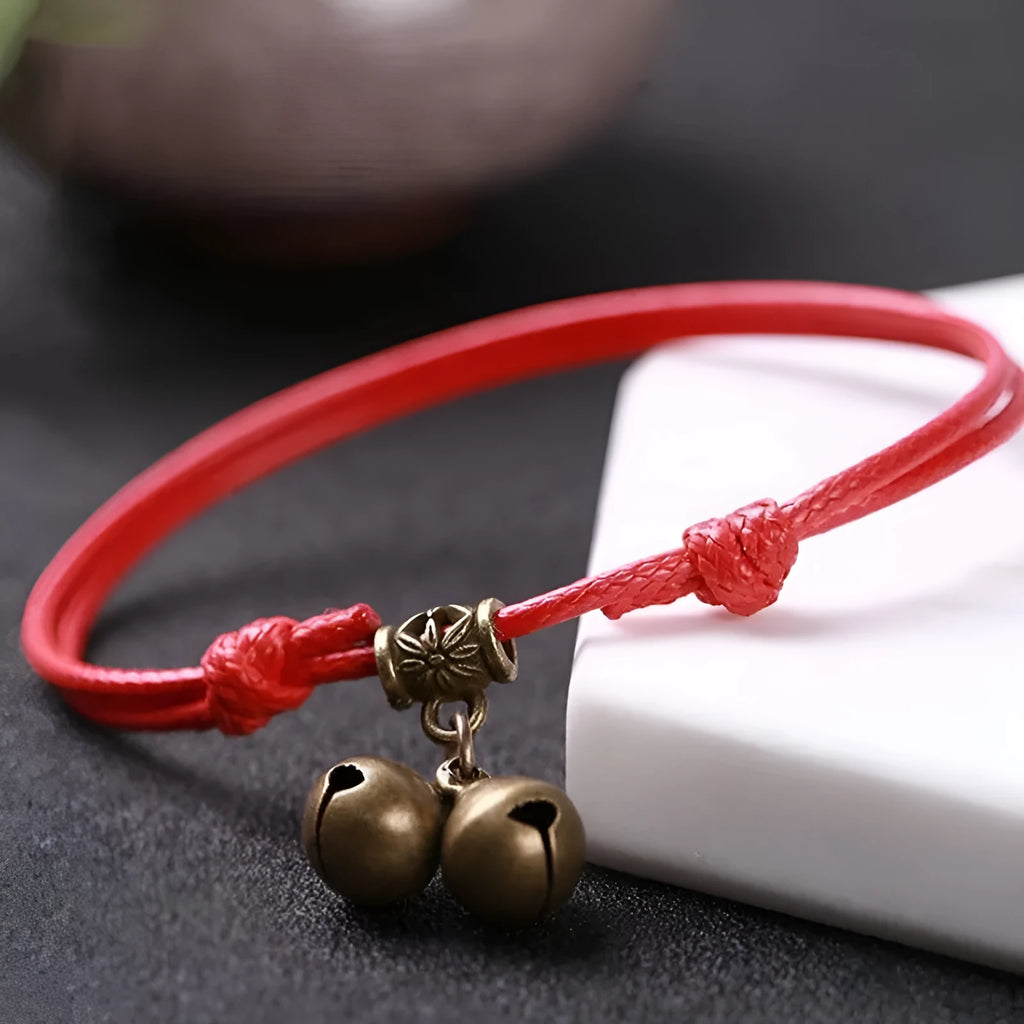 Nylon rope dog collar with a brass bell, shown in black, red, and coffee colour options.