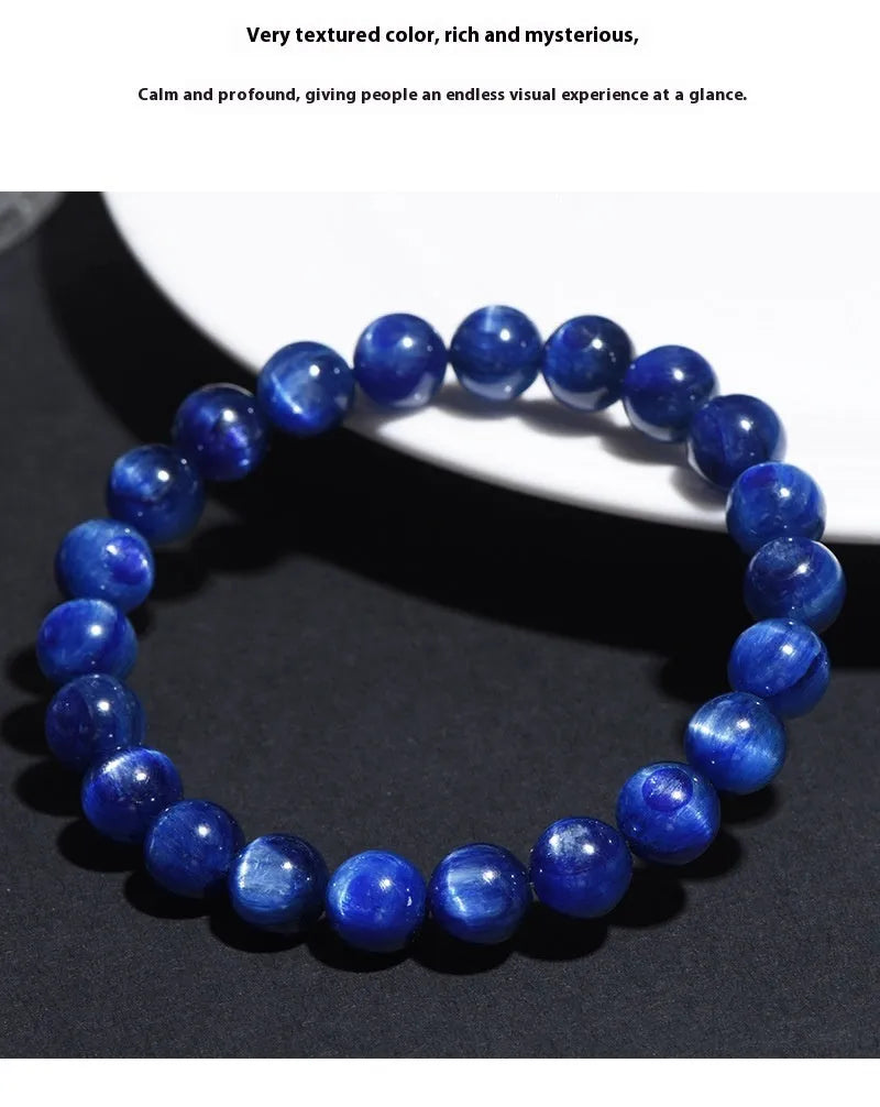 Blue crystal ball bracelet with geometric shape and Ruyi design elements on polished natural crystal