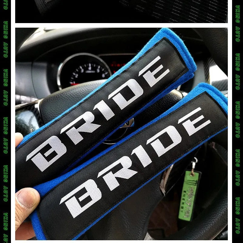 Pair of cotton car safety belt shoulder pads in black blue and red with embroidery