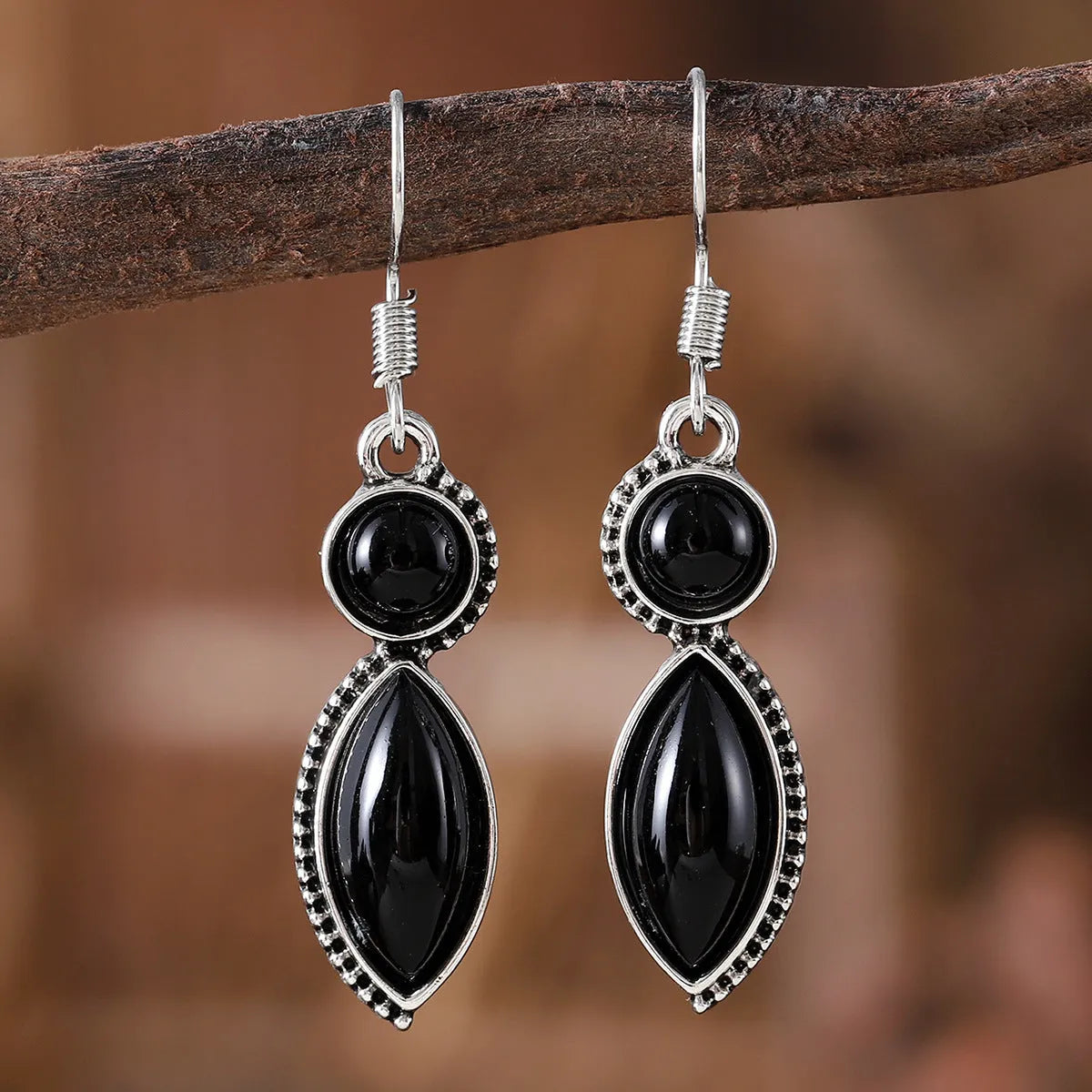 Vintage geometric pendant earrings with black and purple colours and Bohemian design