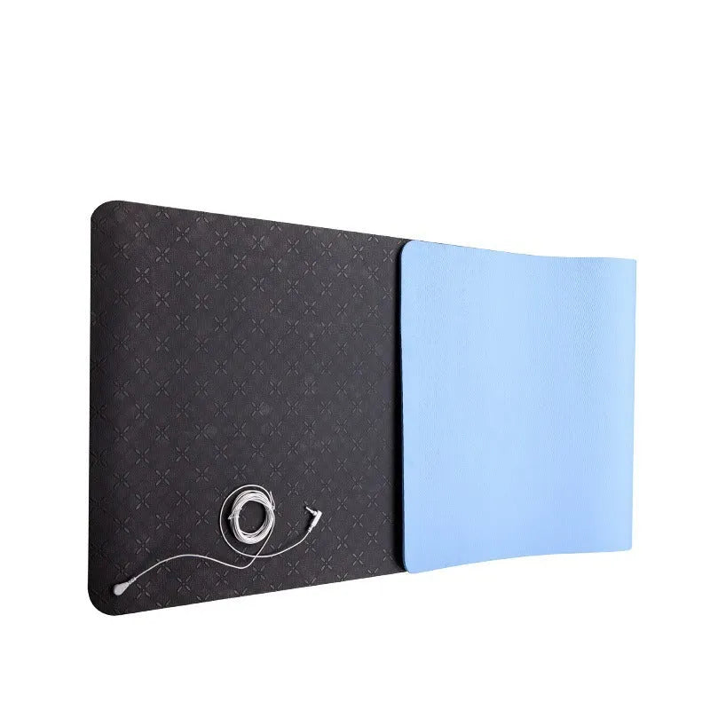 Blue conductive yoga mat with floral pattern and grounding wire for earthing exercises