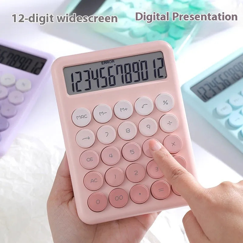 Vibrant gradient colour desktop calculator on a desk, shown in violet, pink, blue and green colour options.