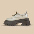 White women's platform Mary Jane shoes with round toe, chunky heel, and front lace-up in British college style.