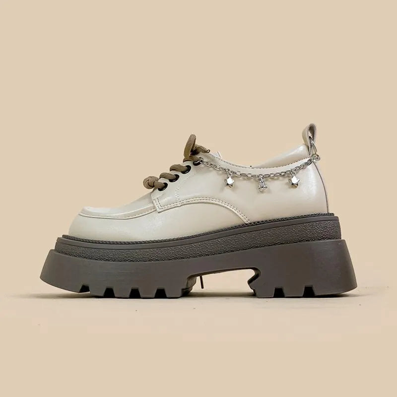White women's platform Mary Jane shoes with round toe, chunky heel, and front lace-up in British college style.
