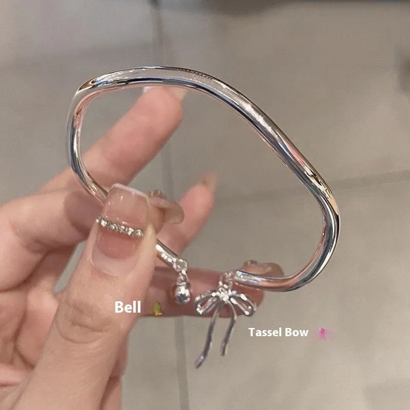 Silver bow adjustable bracelet with bell opening clasp on zinc alloy chain
