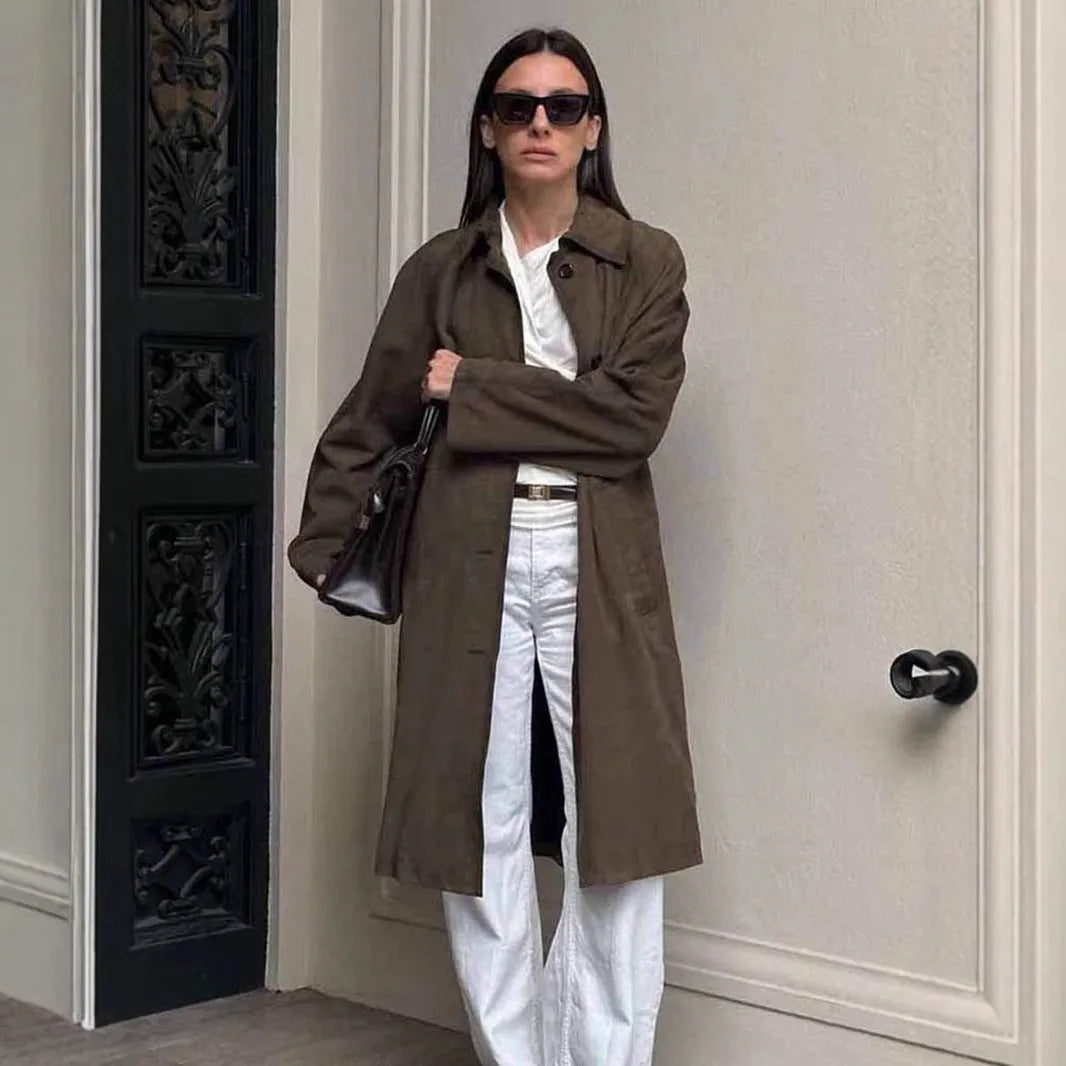 Vintage brown suede coat with loose lapels, raglan sleeves, and front pockets