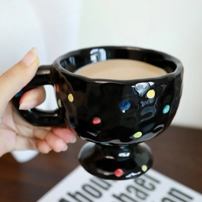 Hand-pinched irregular ceramic mug in solid colour with modern design and 14.5cm height