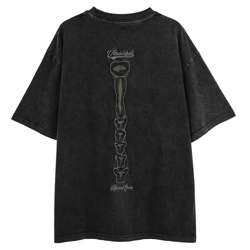 Brown cotton t-shirt with a large black skull graphic print and drop-shoulder sleeves.