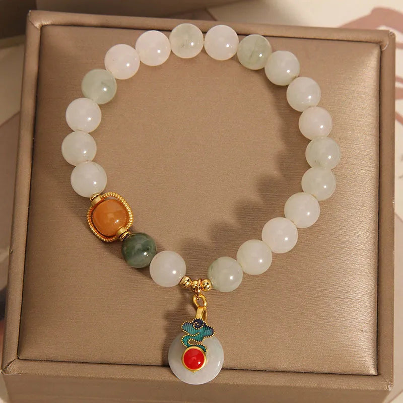 Ice jade crystal bracelet for women with pearl details and a peace jade buckle.