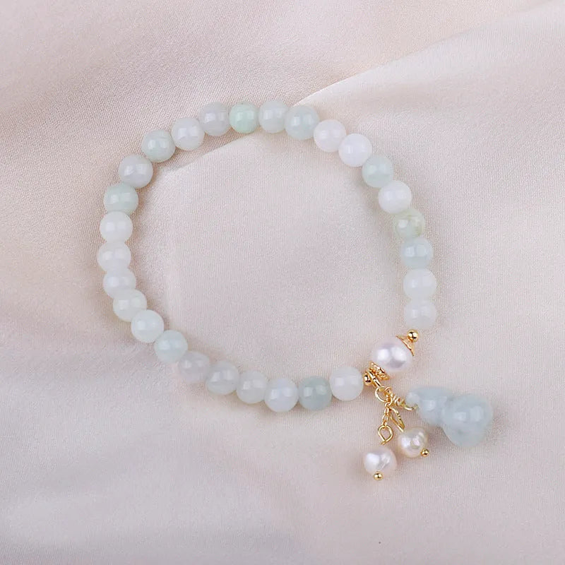 Handmade Chinese style jade bracelet with emerald colour, gourd design and pearl accents
