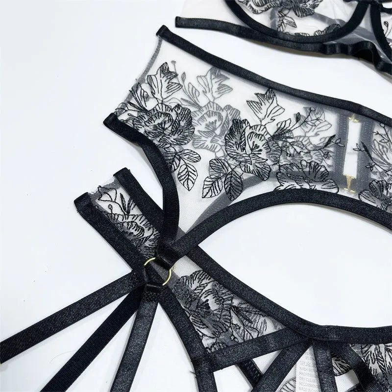 Black women's lace mesh three-piece set with floral print, showing top, pants, and waist ring.